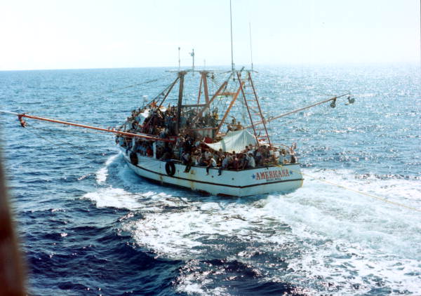 Cuban refugees aboard the overcrowded fishing vessel 'Americana' crossing the Florida Straits during the 1980 Mariel boatlift, which brought 125,000 Cubans to the US after Castro opened the port of Mariel. Photo: Florida Memory.